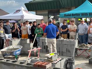 People learning about concrete masonry
